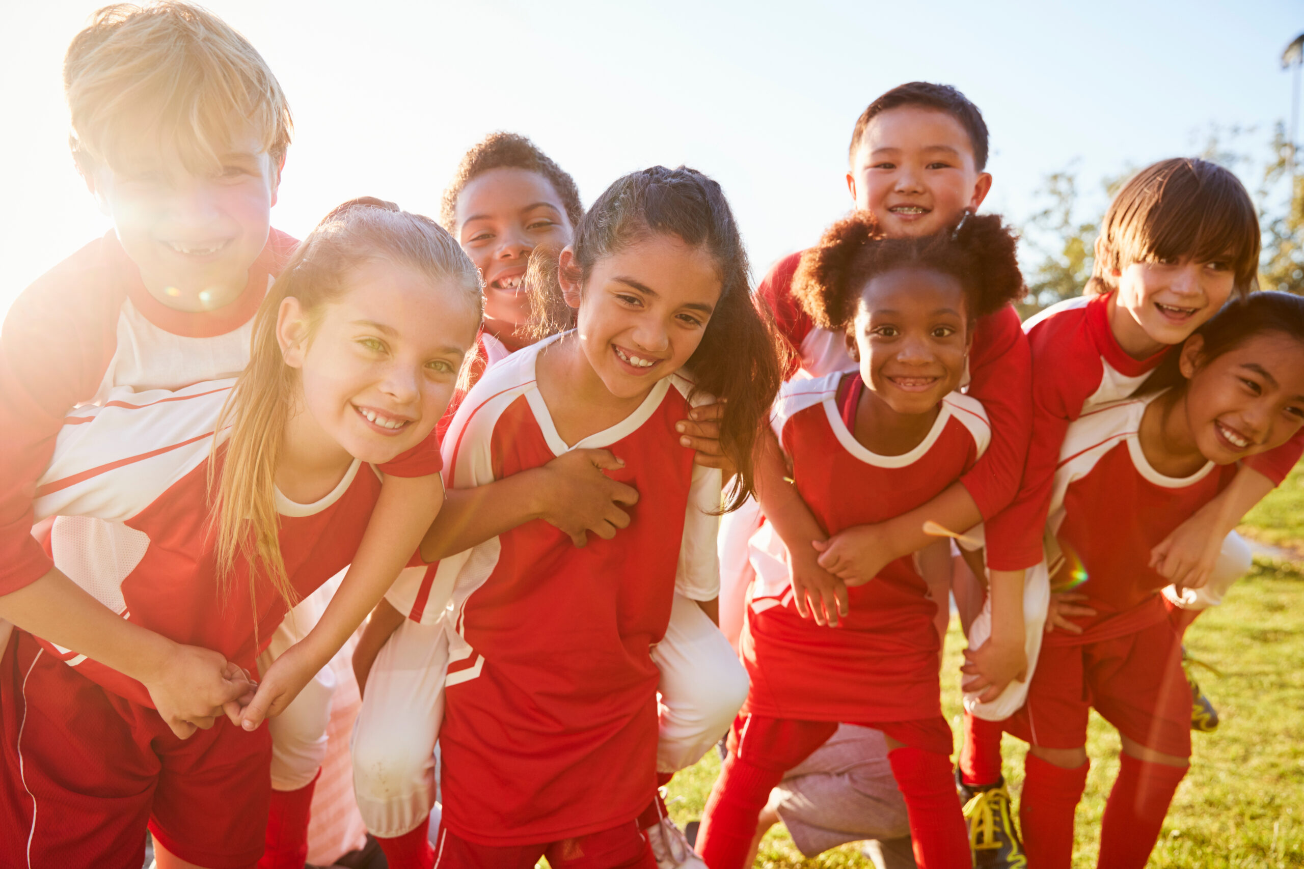 Primary School Children in PE showing enjoyment, sportsmanship and teamwork
